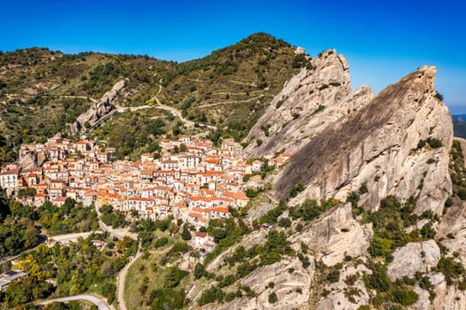 The picturesque village of Castelmezzano, province of Potenza, Basilicata, Italy. Cityscape aerial view of medieval city of Castelmazzano, Italy. Castelmezzano village in Apennines Dolomiti Lucane.