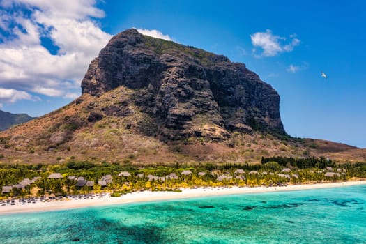 Tropical scenery, beautiful beaches of Mauritius island, Le Morne, popular luxury resort. Le Morne beach luxury resorts, Mauritius. Luxury beach in Mauritius, sandy beach with palms and blue ocean. 