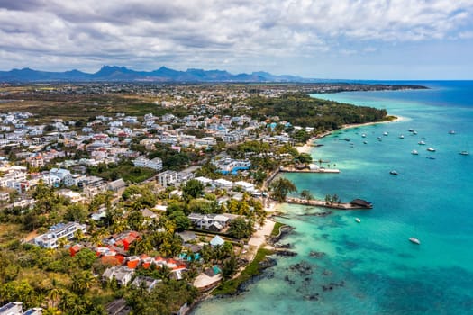 Mauritius beach aerial view of Mont Choisy beach in Grand Baie, Pereybere North. Mont Choisy, public beach in Mauritius island, Africa. Beautiful beach of Mont Choisy in Mauritius, drone aerial view.