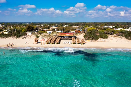 Punta Prosciutto azure sea water, crystal clear water on beach Punta Prosciutto, Italian Maldives Puglia Italy. Punta Prosciutto in Apulia, one of the most beautiful beaches of Italy.