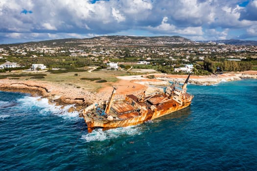 Abandoned Edro III Shipwreck at seashore of Peyia, near Paphos, Cyprus. Historic Edro III Shipwreck site on the shore of the water in Cyprus. Aerial view of Shipwreck EDRO III, Pegeia, Paphos.