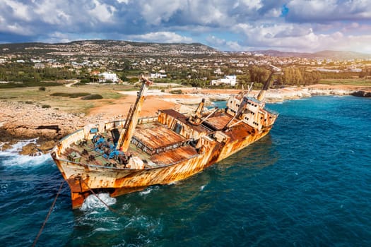Abandoned Edro III Shipwreck at seashore of Peyia, near Paphos, Cyprus. Historic Edro III Shipwreck site on the shore of the water in Cyprus. Aerial view of Shipwreck EDRO III, Pegeia, Paphos.