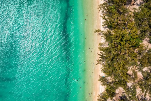 Mauritius beach aerial view of Mont Choisy beach in Grand Baie, Pereybere North. Mont Choisy, public beach in Mauritius island, Africa. Beautiful beach of Mont Choisy in Mauritius, drone aerial view.