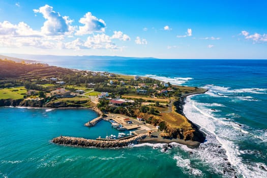 Small local harbor with colorful fishing boats at Pomos,Cyprus. Aerial view of Pomos fishermans harbour in Cyprus.