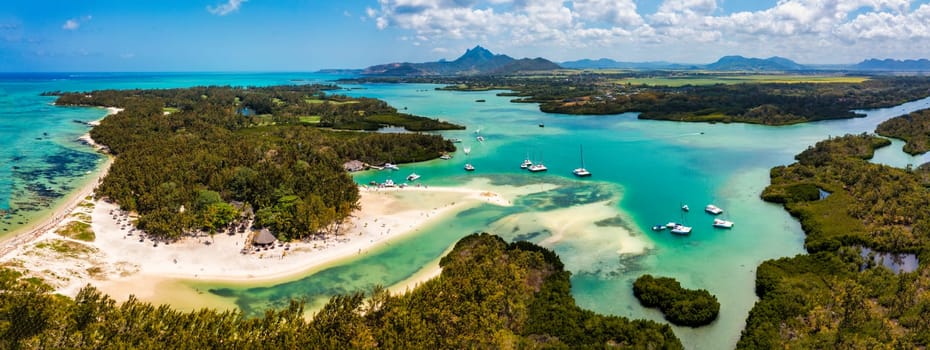 Ile aux Cerfs island with idyllic beach scene, aquamarine sea and soft sand, Ile aux Cerfs, Mauritius, Indian Ocean, Africa. Ile aux Cerf in Mauritius, beautiful water and breathtaking landscape.