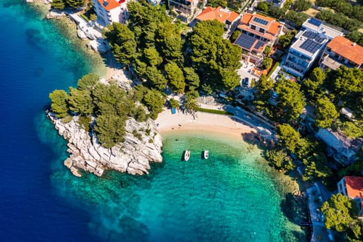 Amazing aerial view of the beautiful Podrace beach in Brela, Makarska Riviera, Croatia. Aerial view of Podrace beach and waterfront on Makarska riviera, Brela, Dalmatia region of Croatia.