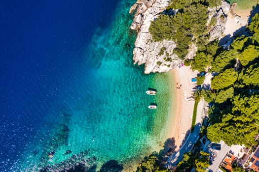 Amazing aerial view of the beautiful Podrace beach in Brela, Makarska Riviera, Croatia. Aerial view of Podrace beach and waterfront on Makarska riviera, Brela, Dalmatia region of Croatia.