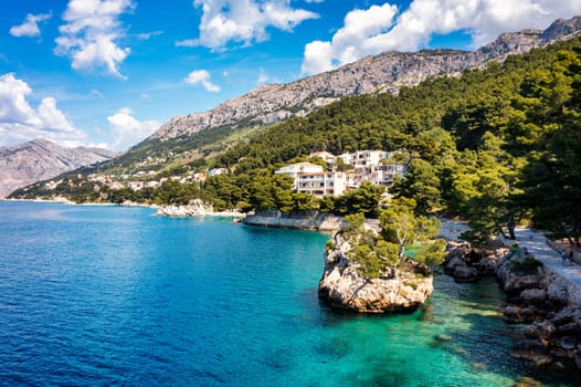 Kamen Brela symbol of the city of Brela on Adriatic coast of Dalmatia, Croatia. Kamen Brela, tiny famous island in Brela, Makarska Riviera, Dalmatia, Croatia.