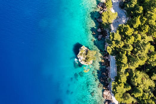 Kamen Brela symbol of the city of Brela on Adriatic coast of Dalmatia, Croatia. Kamen Brela, tiny famous island in Brela, Makarska Riviera, Dalmatia, Croatia.