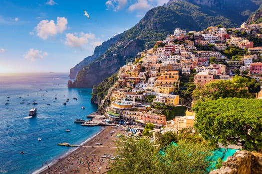 View of Positano with comfortable beach and blue sea on Amalfi Coast in Campania, Italy. Positano village on the Amalfi Coast, Salerno, Campania. Beautiful Positano, Amalfi Coast in Campania.