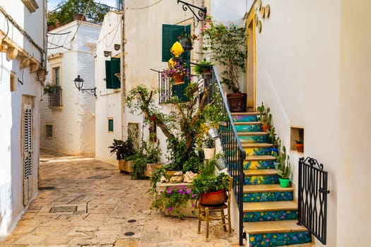 Scenic sight in Locorotondo, Bari Province, Apulia (Puglia), Italy. Characteristic streets in the Locorotondo in Puglia, Italy. Locorotondo is a town of the Metropolitan City of Bari, Apulia, Italy.