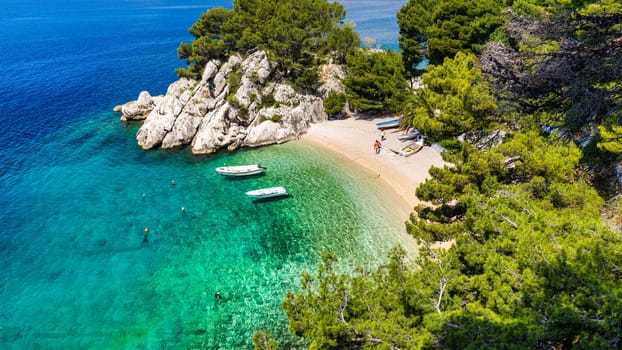 Amazing aerial view of the beautiful Podrace beach in Brela, Makarska Riviera, Croatia. Aerial view of Podrace beach and waterfront on Makarska riviera, Brela, Dalmatia region of Croatia.