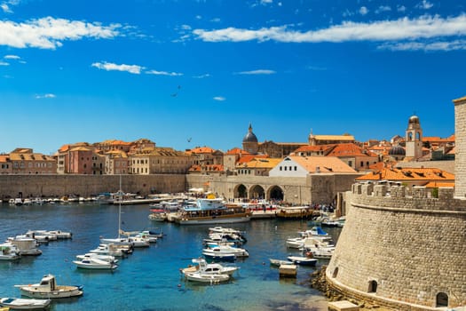 Dubrovnik a city in southern Croatia fronting the Adriatic Sea, Europe. Old city center of famous town Dubrovnik, Croatia. Picturesque view on Dubrovnik old town (medieval Ragusa) and Dalmatian Coast.