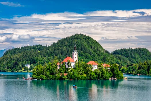 Lake Bled in Slovenia. Beautiful mountains and Bled lake with small Pilgrimage Church. Bled lake and island with Pilgrimage Church of the Assumption of Maria. Bled, Slovenia, Europe.