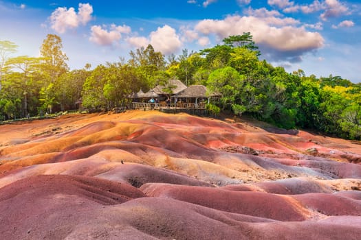 Chamarel Seven Colored Earth Geopark in Mauritius Island. Colorful panoramic landscape about this volcanic geological formation Chamarel Seven Colored Earth Geopark in Riviere noire district.