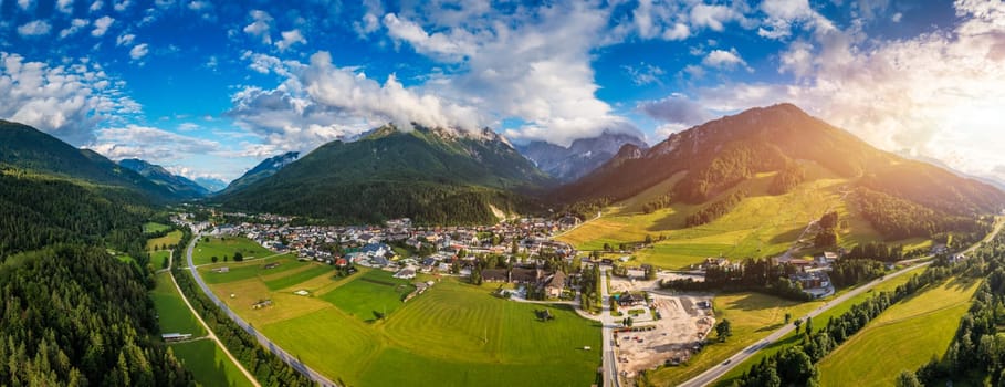 Kranjska Gora town in Slovenia at summer with beautiful nature and mountains in the background. View of mountain landscape next to Kranjska Gora in Slovenia, view from the top the town Kranjska Gora.