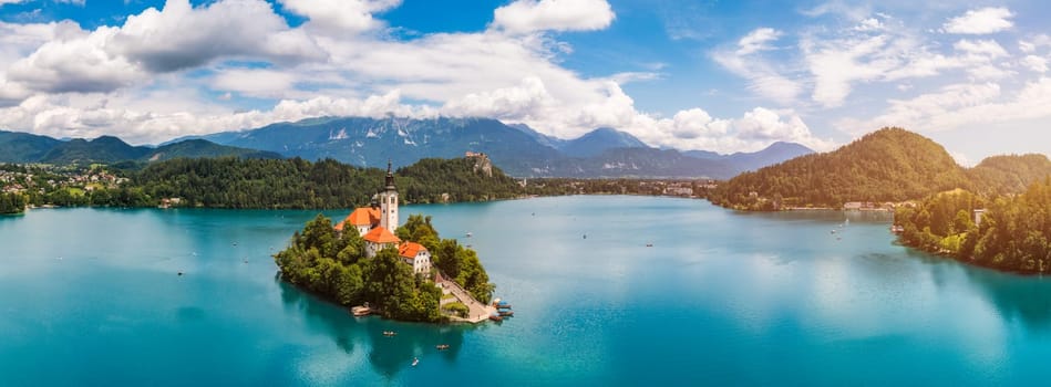 Lake Bled in Slovenia. Beautiful mountains and Bled lake with small Pilgrimage Church. Bled lake and island with Pilgrimage Church of the Assumption of Maria. Bled, Slovenia, Europe.