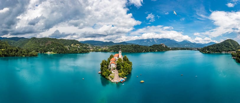 Lake Bled in Slovenia. Beautiful mountains and Bled lake with small Pilgrimage Church. Bled lake and island with Pilgrimage Church of the Assumption of Maria. Bled, Slovenia, Europe.