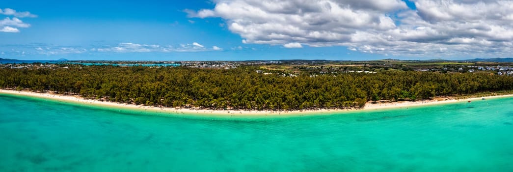 Mauritius beach aerial view of Mont Choisy beach in Grand Baie, Pereybere North. Mont Choisy, public beach in Mauritius island, Africa. Beautiful beach of Mont Choisy in Mauritius, drone aerial view.