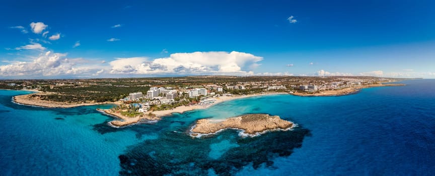 Aerial view of beautiful Nissi beach in Ayia Napa, Cyprus. Nissi beach in Ayia Napa famous tourist beach in Cyprus. A view of a azzure water and Nissi beach in Aiya Napa, Cyprus.