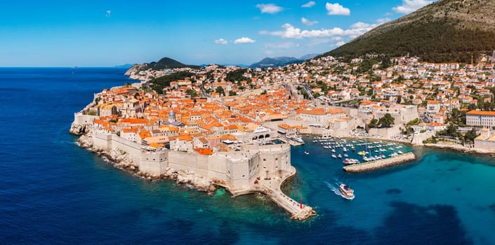 Dubrovnik a city in southern Croatia fronting the Adriatic Sea, Europe. Old city center of famous town Dubrovnik, Croatia. Picturesque view on Dubrovnik old town (medieval Ragusa) and Dalmatian Coast.