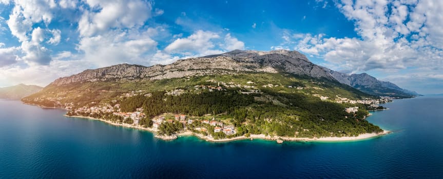 Beautiful aerial view of Punta Rata beach in Brela, Makarska Riviera, Croatia. Aerial view of Punta Rata beach and waterfront on Makarska riviera, Brela, Dalmatia region of Croatia.