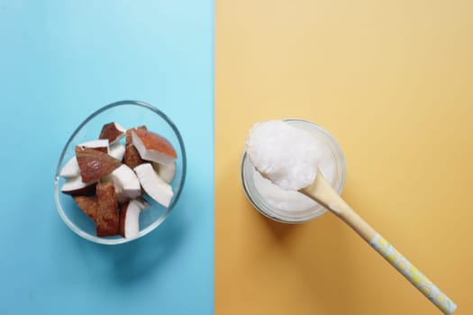 slice of fresh coconut on a table cloth .