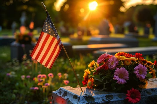 memory day concept. A small American flag is on a rock in a cemetery.