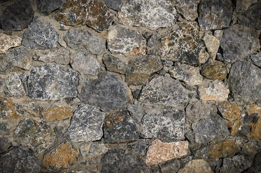 Granite stones of different shapes and colors. Wall cladding. 4