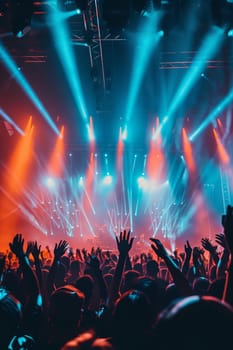 Rock band performs energetically on stage, illuminated by striking blue red lights with a crowd of fans enjoying the music