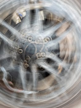 The motion blurred image of the vehicle wheel