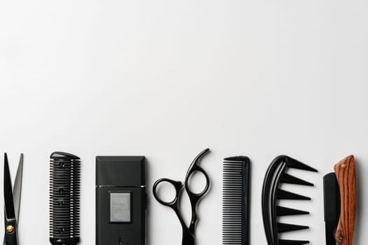 Set of barber tools for haircut on gray background flat lay studio shot