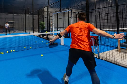 Paddle training of a young player. High quality photo