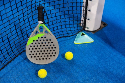 paddle rackets on the playing court. High quality photo