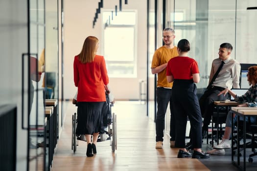 A dynamic group of young entrepreneurs engages in vibrant discussion within a modern glass office space, exploring new business projects and fostering innovation.