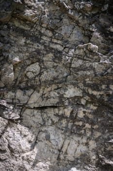 Close-up. Dark gray stone basalt background for design. Banner. 2
