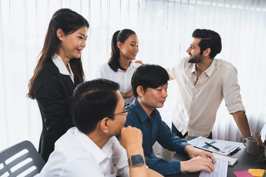 Group of diverse office worker employee working together on strategic business marketing planning in corporate office room. Positive teamwork in business workplace concept. Prudent