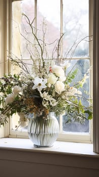 Beautiful floral arrangement with winter, autumn or early spring botanical plants and flowers