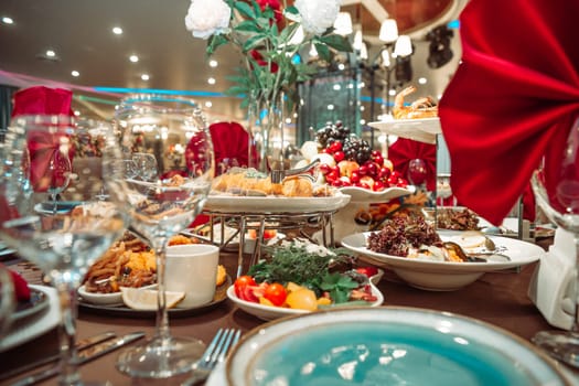 festive table in the restaurant with delicious dishes.