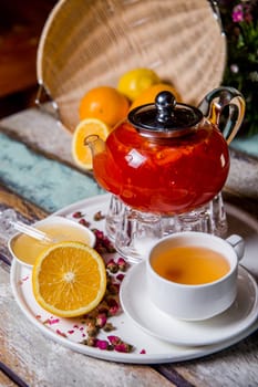 fruit tea in a glass teapot at a tea ceremony.