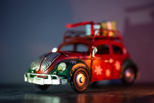 toy iron car model with gifts on the roof. interior detail.