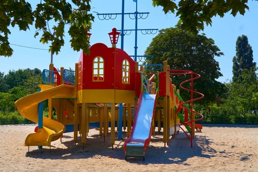 an outdoor area provided for children to play in, especially at a school or public park