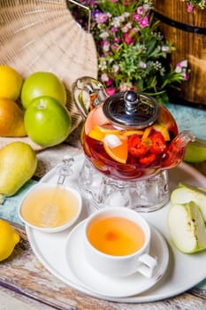 bright summer fruit tea on the table in the restaurant.