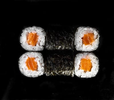 rolls isolated on black background. Photo for the menu