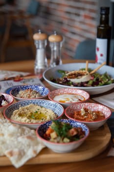 business lanch in a Turkish restaurant with appetizing dishes.