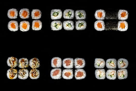 japanese roll set. a set of rolls and sushi on a black background.