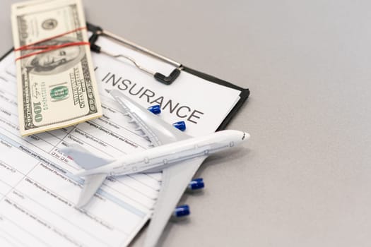 business still life with life insurance words and two hundred dollars. High quality photo