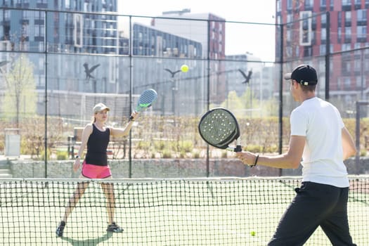 Padel lesson with a coach, personalized instruction in a supportive environment. High quality photo