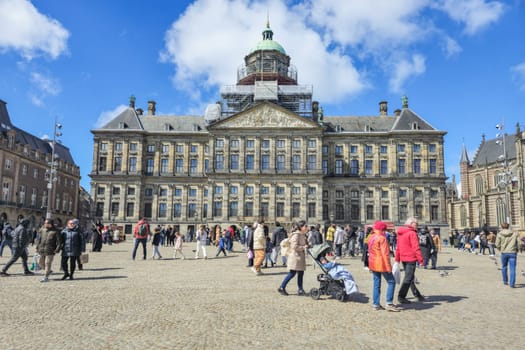 Amsterdam Netherlands 21 April 2024, A bustling scene with People moving around life and motion at the Dam Central square