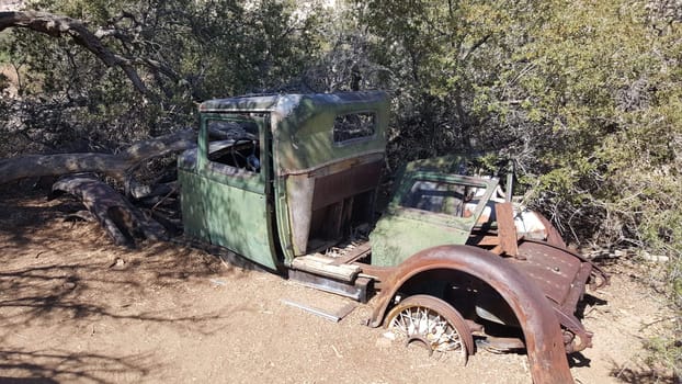 Abandoned Old Car Being Reclaimed by the California Desert. High quality photo